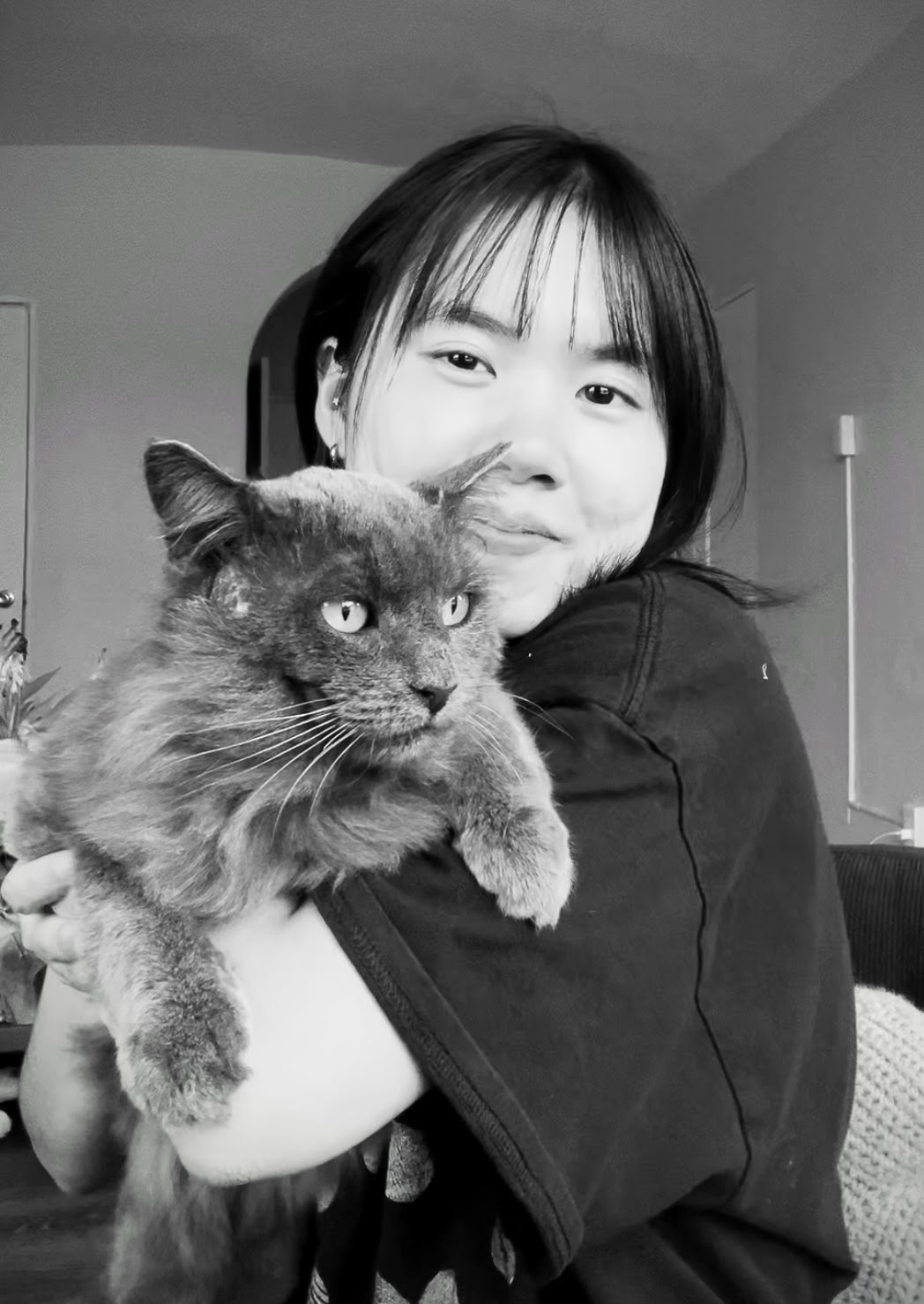 Me, holding my cat, Benny